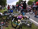 The entire pelaton came crashing down after a spectator reached out into the road with a placard (Photo: Getty Images)
