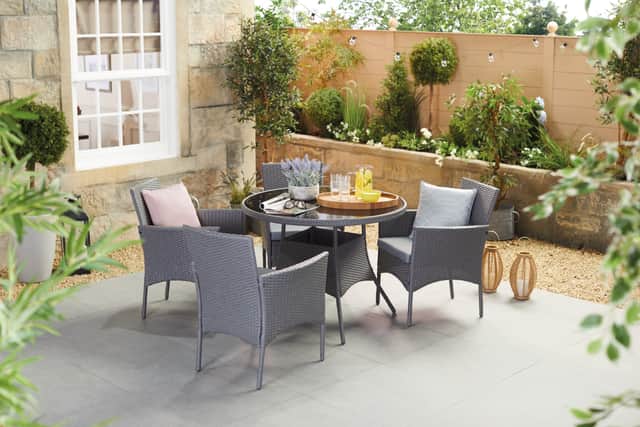 The Rattan five piece dining set which is available at a discounted price