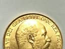 The treasure trove found scattered across the home included a gold Edward VII £2 coin from 1902. 