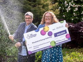 National Lottery winners Liz and George Galloway celebrate after winning Â£300,000 on the National Lottery Bingo Bonus Scratch card in Glasgow. (Photo: Anthony Devlin)
