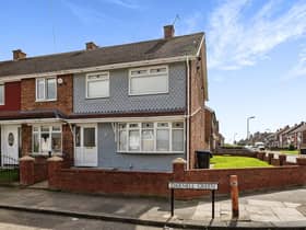 A three-bedroom home has gone up for sale with an interesting feature - a wall with a huge Peaky Blinders mural. 