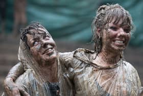 Muddy festival goers at Glastonbury will be able to get a free shower this year