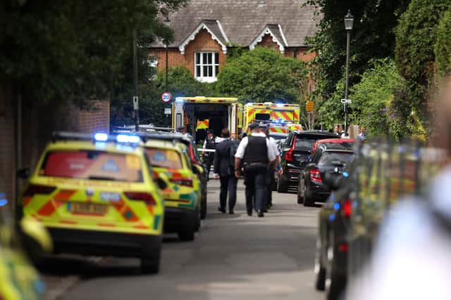 Police and emergency services attend the scene of a car crash at The Study Preparatory School in Wimbledon