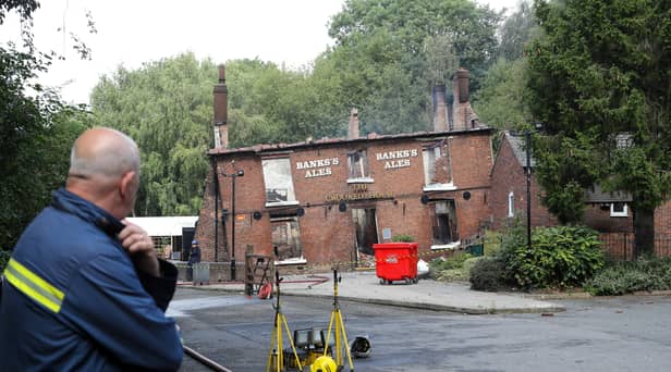 Fire crews at The Crooked House pub