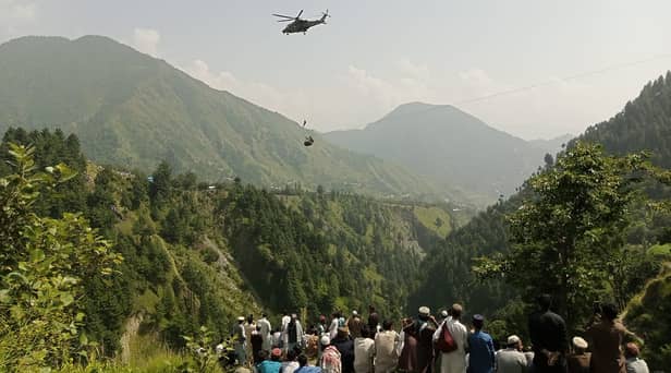 Eight people have been rescued after being trapped inside a cable car in Pakistan