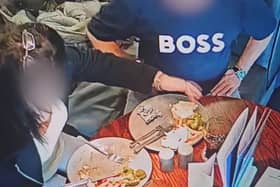 A pub customer has been caught on CCTV placing their own hair into their food in an attempt to get a refund for their meal. (Credit: Tom Croft / SWNS)