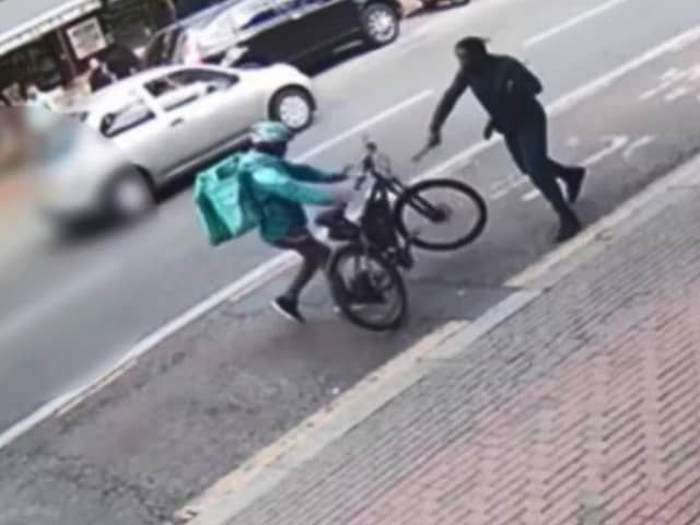 A knife-wielding man attacks a Deliveroo rider.