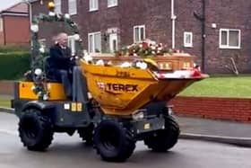 Dave Newton's funeral with his coffin in a dumper truck. 