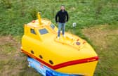 A lifeboat found floating in the sea has been turned into a real-life Yellow Submarine for glamping. 