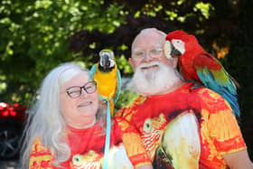 Spider, 66, and Anne Spider-McKeown, 64, from Birmingham, go about their daily routine with two parrots Charlie a green-winged Macaw and Chester, a blue-and-gold Macaw. May 19, 2024. 