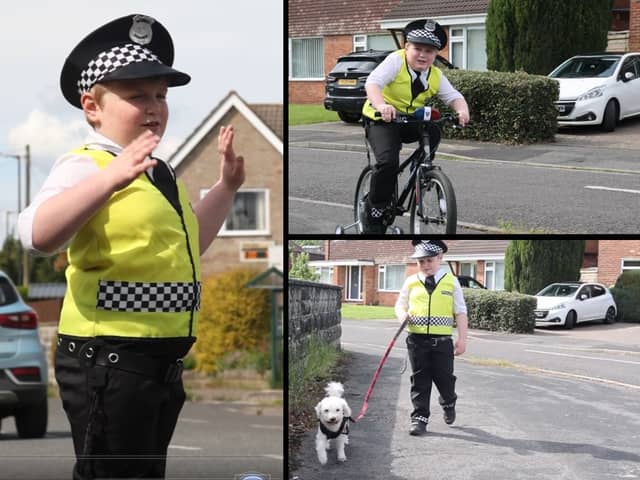 Finley Bollen, six, dresses in an officer's hat and outfit everyday - keeping his town and its people safe on the roads. 