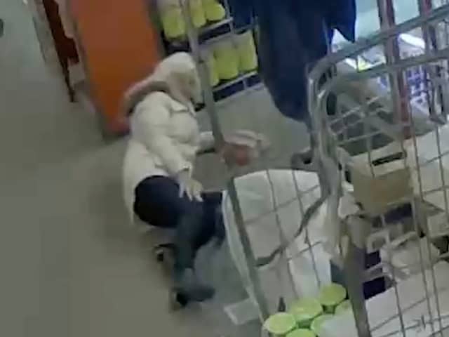 CCTV shows the moment a shopper staged a fake accident in a supermarket to try and claim thousands of pounds in injury compensation from Iceland. 