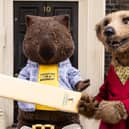 Compare the Market mascots Carl and Aleksandr appeared outside what looks remarkably like 10 Downing Street to mark the start of The Hundred.Photo released July 23 2024. 