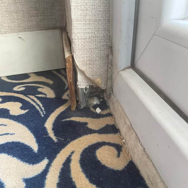 The skirting boards had come away from the wall.