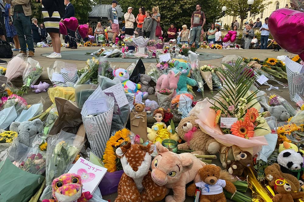 Floral tributes and soft toys are laid following a vigil in Southport, northwest England, on July 30, 2024, a day after a deadly child knife attack. 