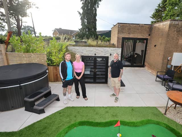 Tyler Richards with his partner Megan Mullen-Knight and his father Darren Richards.