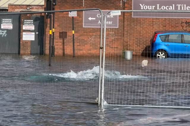 The flooded road in Sparkhill - schools and roads were closed.