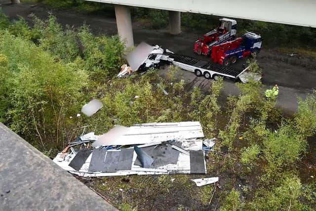 The lorry’s 56-year-old driver was rushed to hospital after the crash between junction 20 and 21 of the M6 at around 6.50pm on Monday. Incredibly, he did not suffer any life-threatening injuries and is expected to be discharged from hospital.