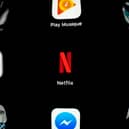 Netflix app. Photo: LIONEL BONAVENTURE/AFP via Getty Images