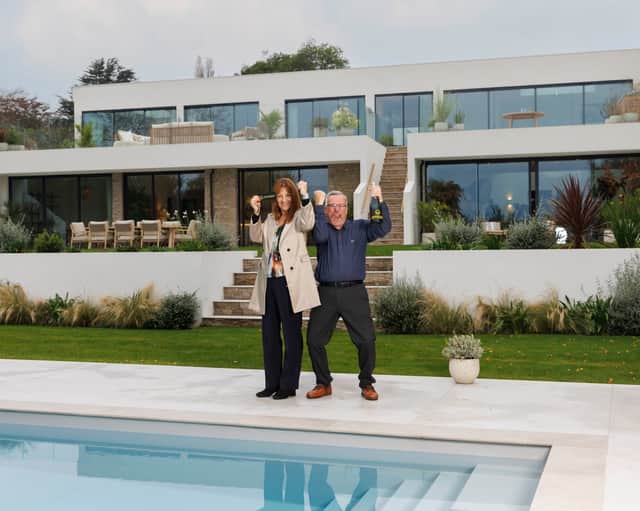 Tom and Carol Steenson Omaze Million Pound House Draw winners at their new £2m home in Devon.