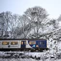 A Northern Rail train in the snow.