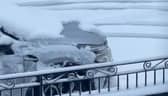 Snow coats roads in Anfield ahead of Liverpool vs Manchester United match.