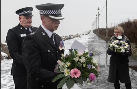 Paying respects at the Gynn Square memorial service to officers who died in the 1983 rescue mission at Blackpool.|Lucinda Herbert, Blackpool Gazette