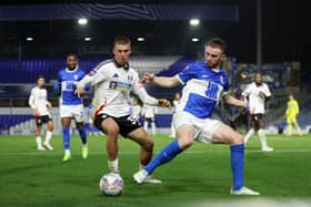 Kristian Sekularac (L) is being linked with a move to Wigan Athletic. There is competition from other teams in League One. 