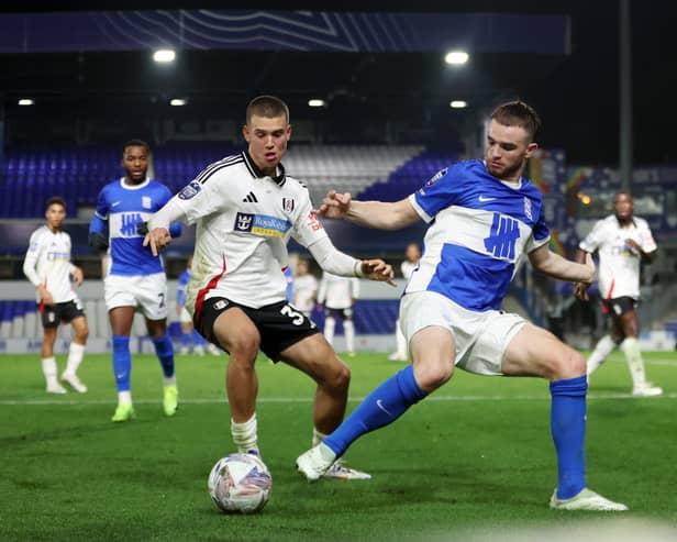 Kristian Sekularac (L) is being linked with a move to Wigan Athletic. There is competition from other teams in League One. 