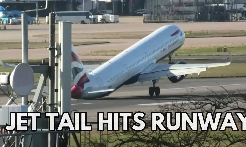 The tail of a plane hitting the ground while trying to land