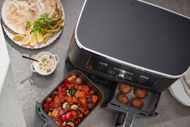 The Foodi Max's dual drawers are so useful for cooking family meals