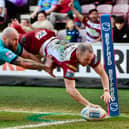 Wigan Warriors winger Liam Marshall scoring a try against Huddersfield Giants