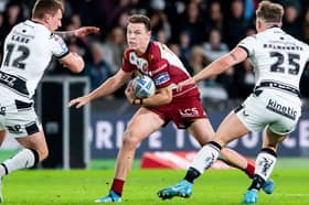 Jai Field in action for Wigan Warriors against Hull FC