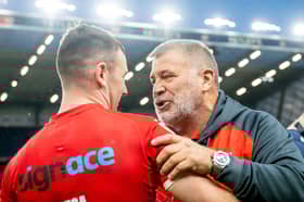 Shaun Wane (right) celebrates England's series win over Tonga with halfback Harry Smith (left)