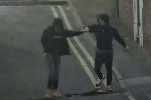 Ramaray Treasure and Leon Sykes fist bump moments after raining blows on a man with West Street with knives in hand.