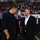 Wigan Warriors coach Matt Peet (left) with Salford Red Devils counterpart Paul Rowley (right) at the Brick Community Stadium in 2024