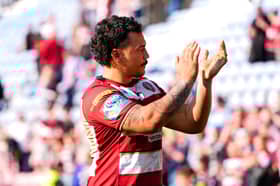 Tyler Dupree applauds the Wigan Warriors fans at the Brick Community Stadium