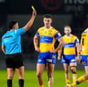 Mikolaj Oledzki (right) is sin-binned in Leeds Rhinos' win at Salford Red Devils in Round Seven
