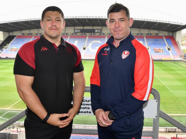 Wigan Warriors coach Matt Peet (left) and St Helens counterpart Paul Wellens (right) at the Brick Community Stadium