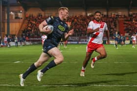 Zach Eckersley scoring a try for Wigan Warriors against Hull KR