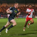 Zach Eckersley scoring a try for Wigan Warriors against Hull KR