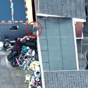 Drug dealer lobs bin bag of heroin over fence during police raid
