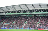 The South Stand at the Good Friday derby between Wigan Warriors and St Helens at a sold-out Brick Community Stadium