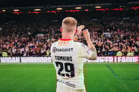 Sam Tomkins applauds the Wigan Warriors fans after the 2023 Super League Grand Final at Old Trafford