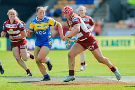 Izzy Rowe in action for Wigan Warriors against Leeds Rhinos  in the Women's Challenge Cup semi-final