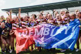 Wigan Warriors Women celebrate getting to the Challenge Cup final at Wembley