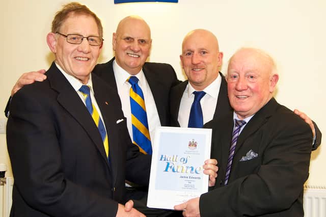Jackie Edwards (right) is presented with his Warrington Wolves Hall of Fame certificate