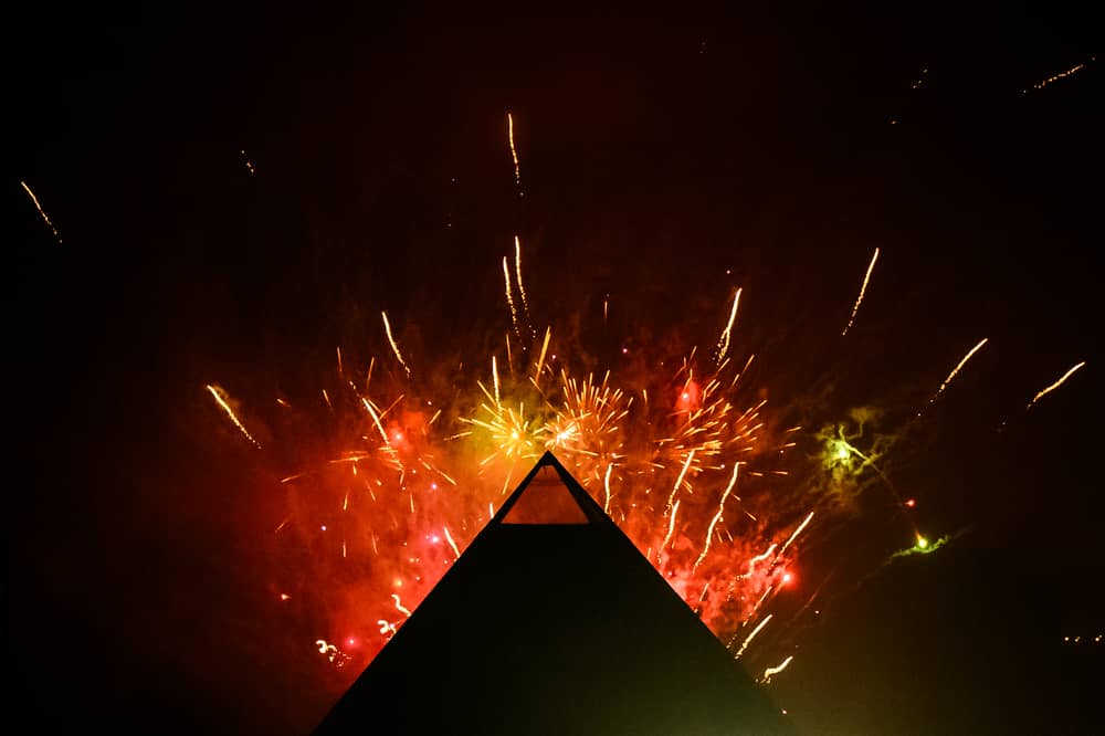 Fireworks explode in the sky above the Pyramid Stage at Glastonbury Festival
