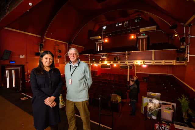 Lisa Nandy on stage with tour guide and set-builder Brian Heap
