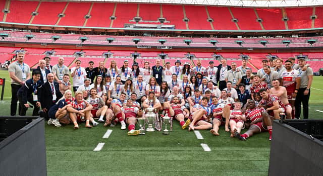 Wigan Warriors' men and women celebrate a Challenge Cup double at Wembley